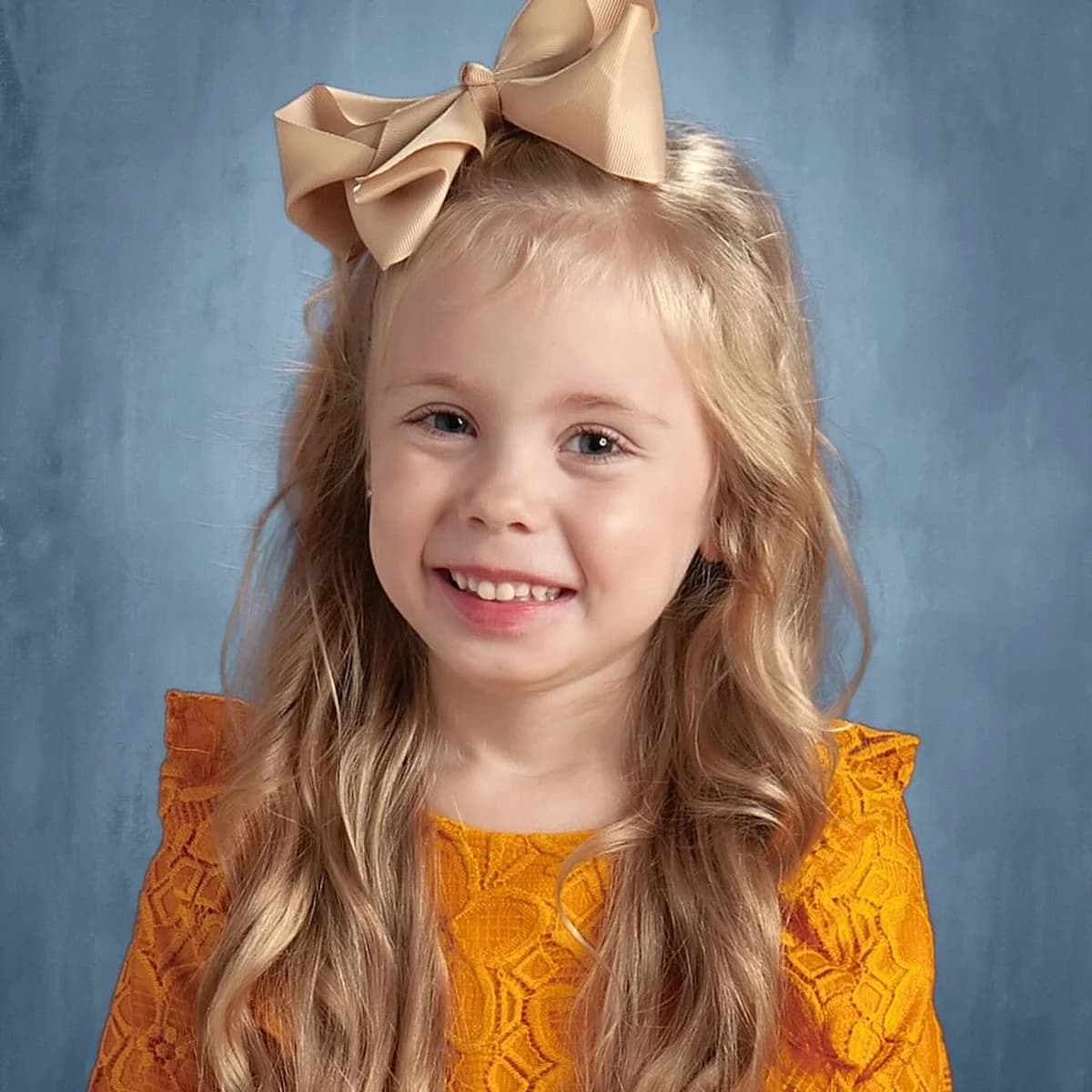 Child school portrait and its stitched canvas — photo
